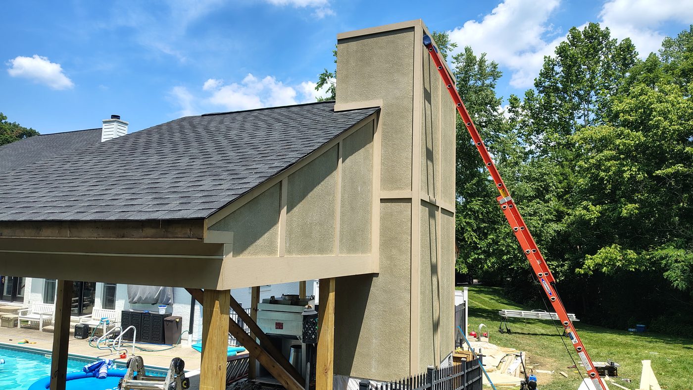 Outdoor pavilion with stucco chimney detail